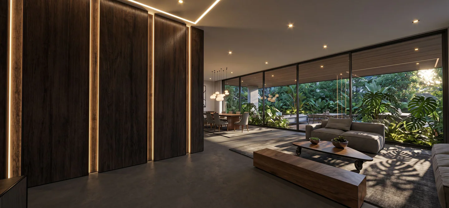 Living room with natural light opening to the tropical landscape
